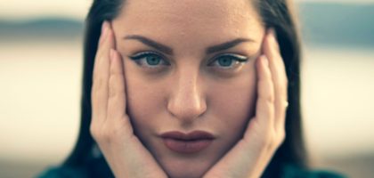 focus photography of woman's face